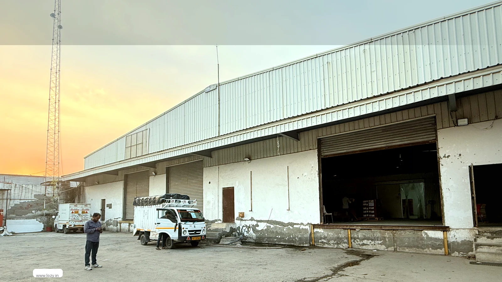 Lozy warehouse building on the Manesar belt, Haryana, with a gated road frontage