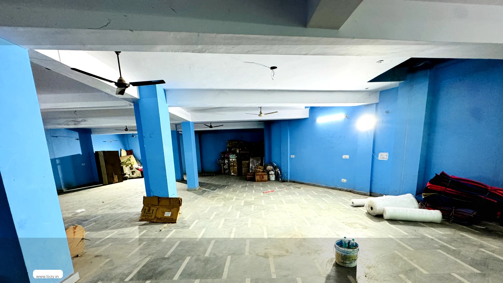 Racked shared warehouse bay with pallet positions at a Lozy facility in Dwarka, Delhi