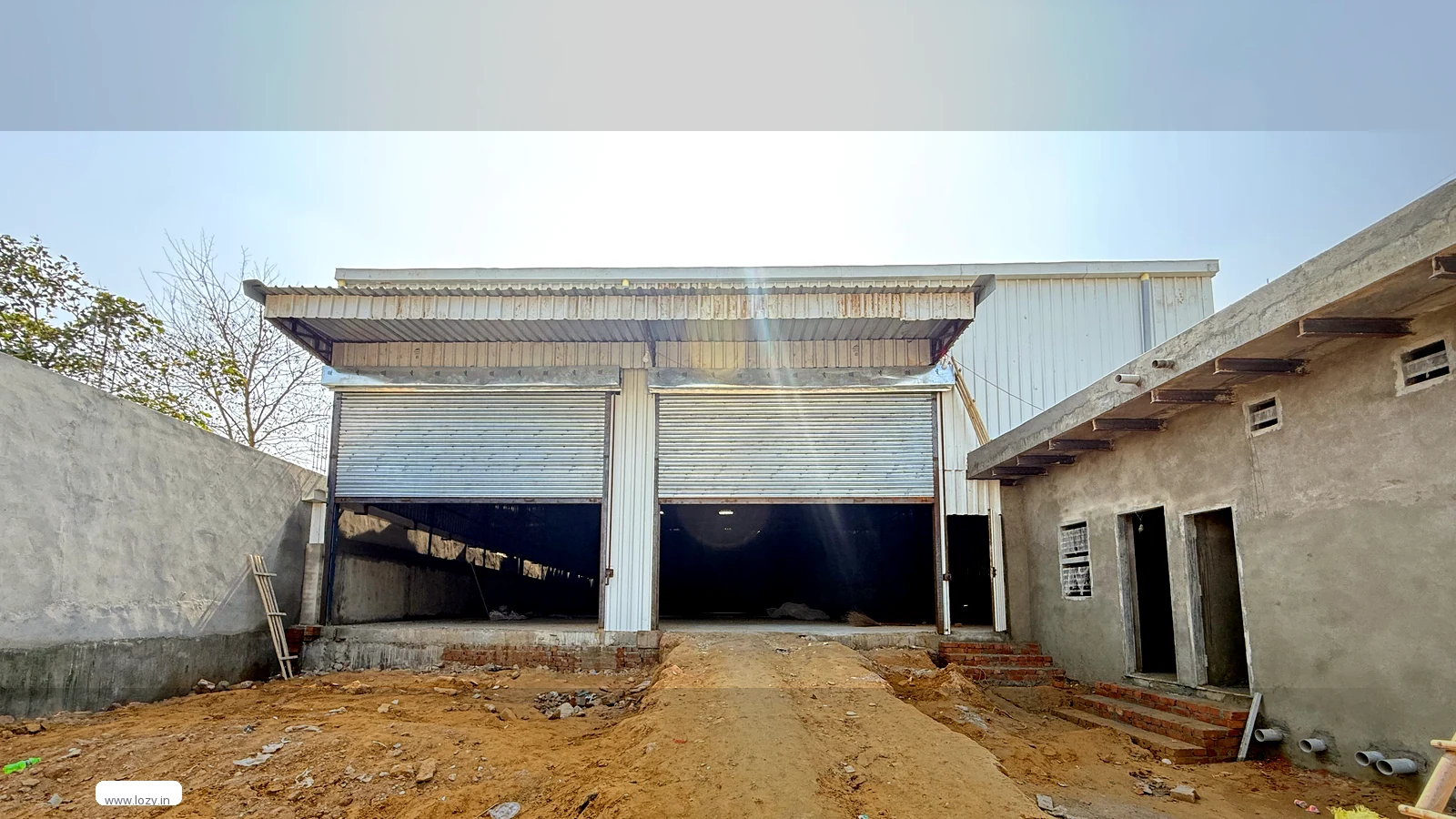 Electrical goods warehousing - a shaded Lozy warehouse at Mansar in the Manesar belt