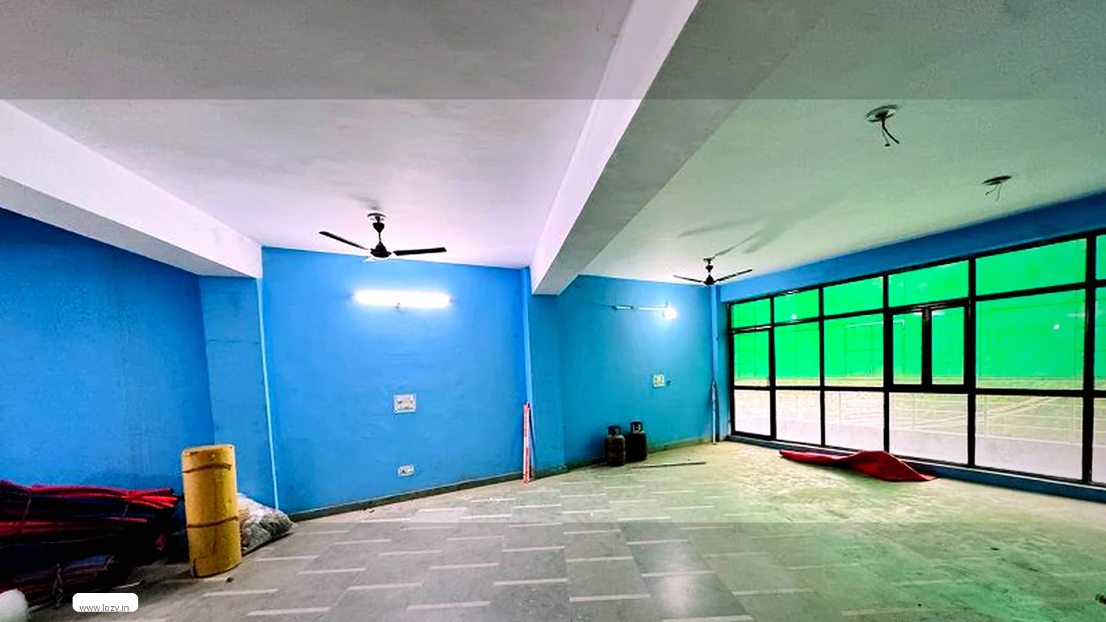 Warehouse floor at a Lozy site serving central India - racked bays and stock staged for the westbound and northbound runs out of Indore