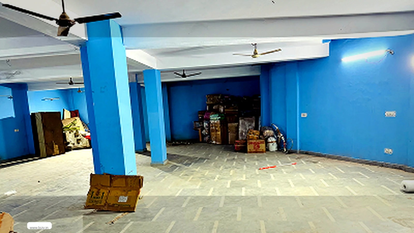 Marked floor bays inside Lozy's shared warehouse in Dwarka, New Delhi